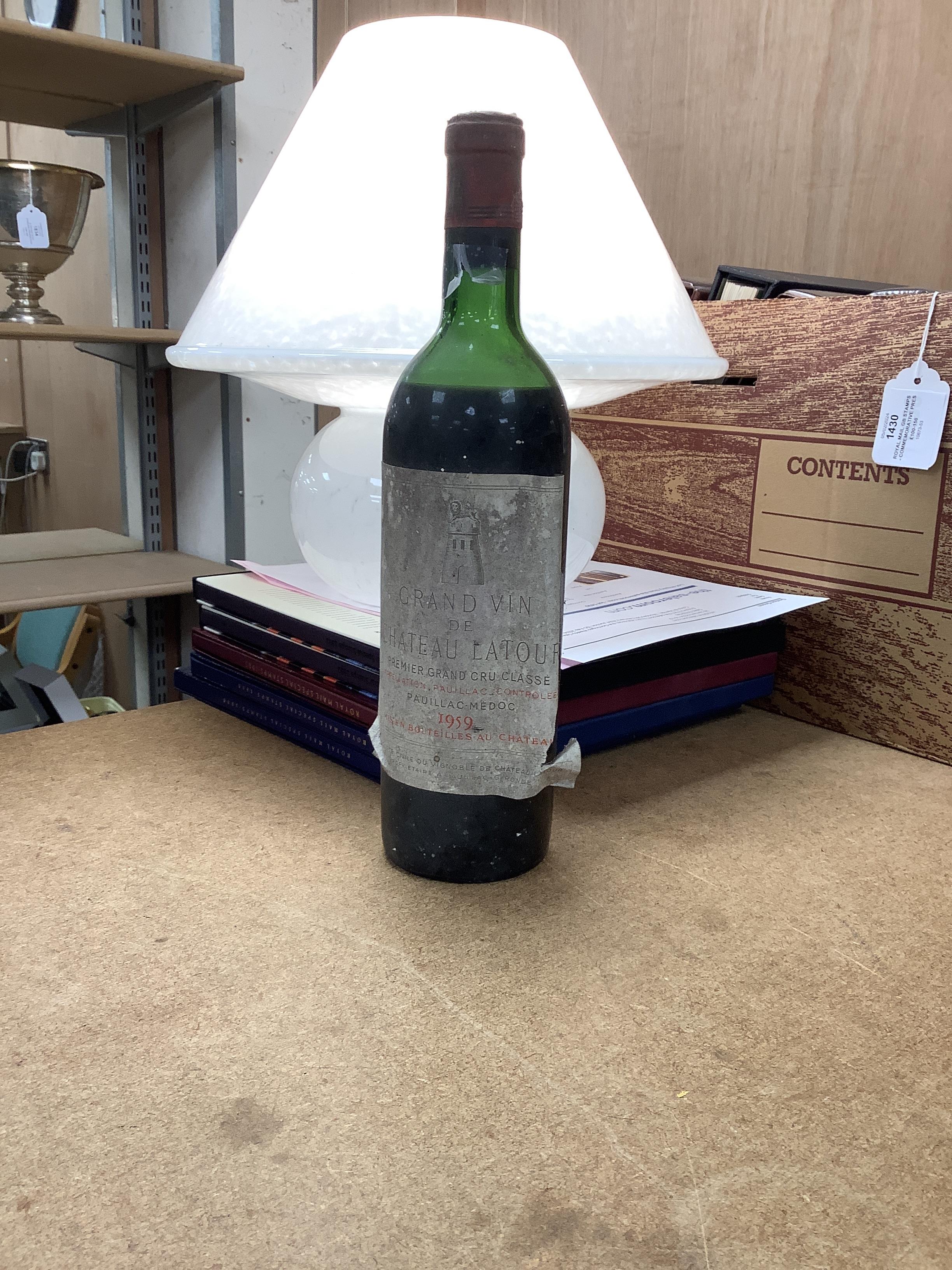 One bottle of 1959 Chateau Latour wine, label damaged